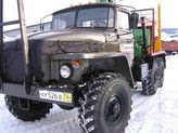 Лесовозный тягач Урал 4320 с манипулятором Атлант-90